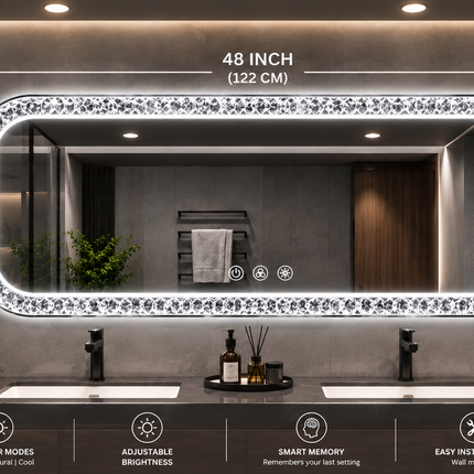 An oval LED-backlit vanity mirror with a crystal-embellished border, shown mounted in a bathroom setting with dimension labels indicating 48 inches wide by 24 inches tall. The image includes branding for 'Glamour Mirror' and feature callouts along the bottom.